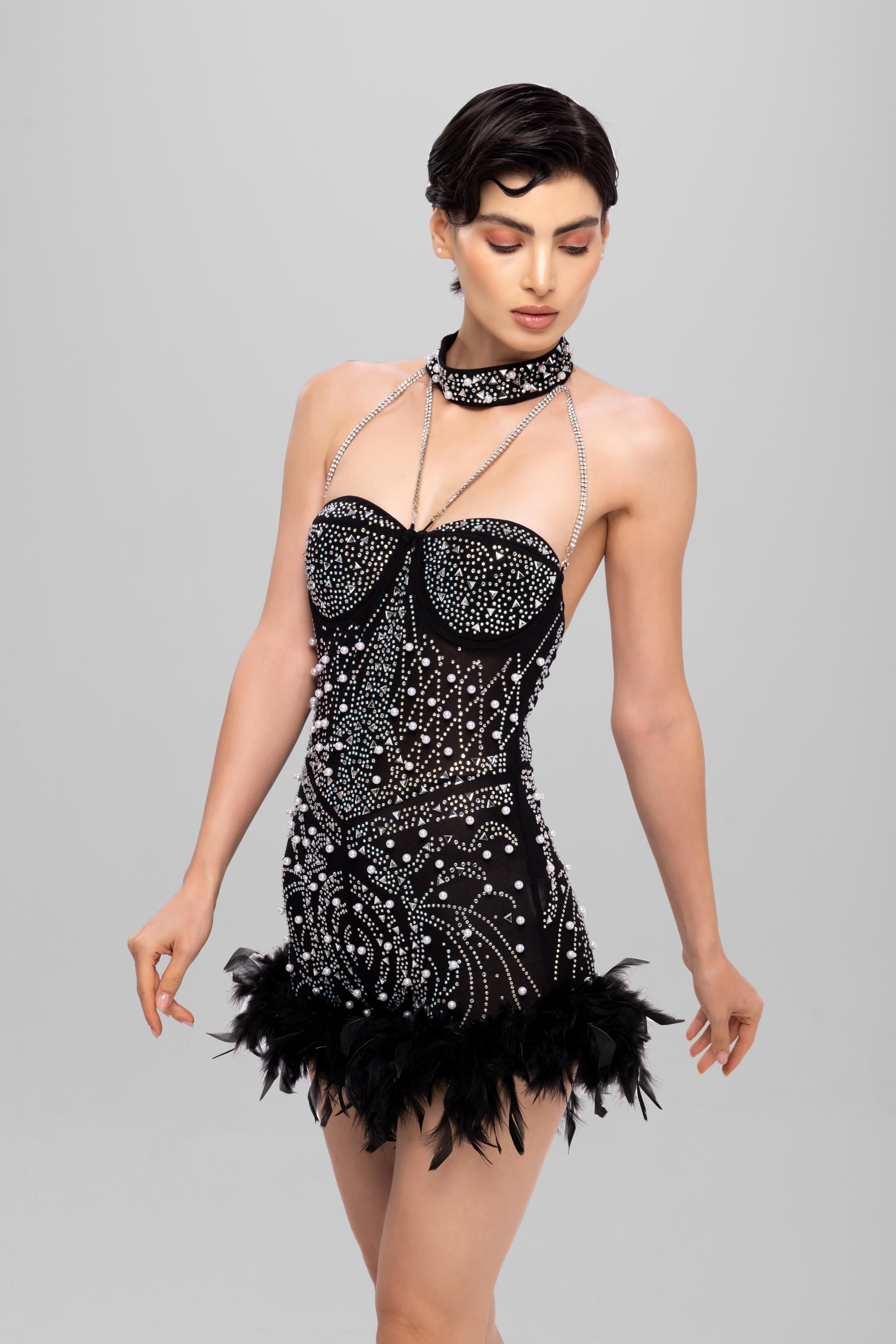 Embellished romper with feather Black