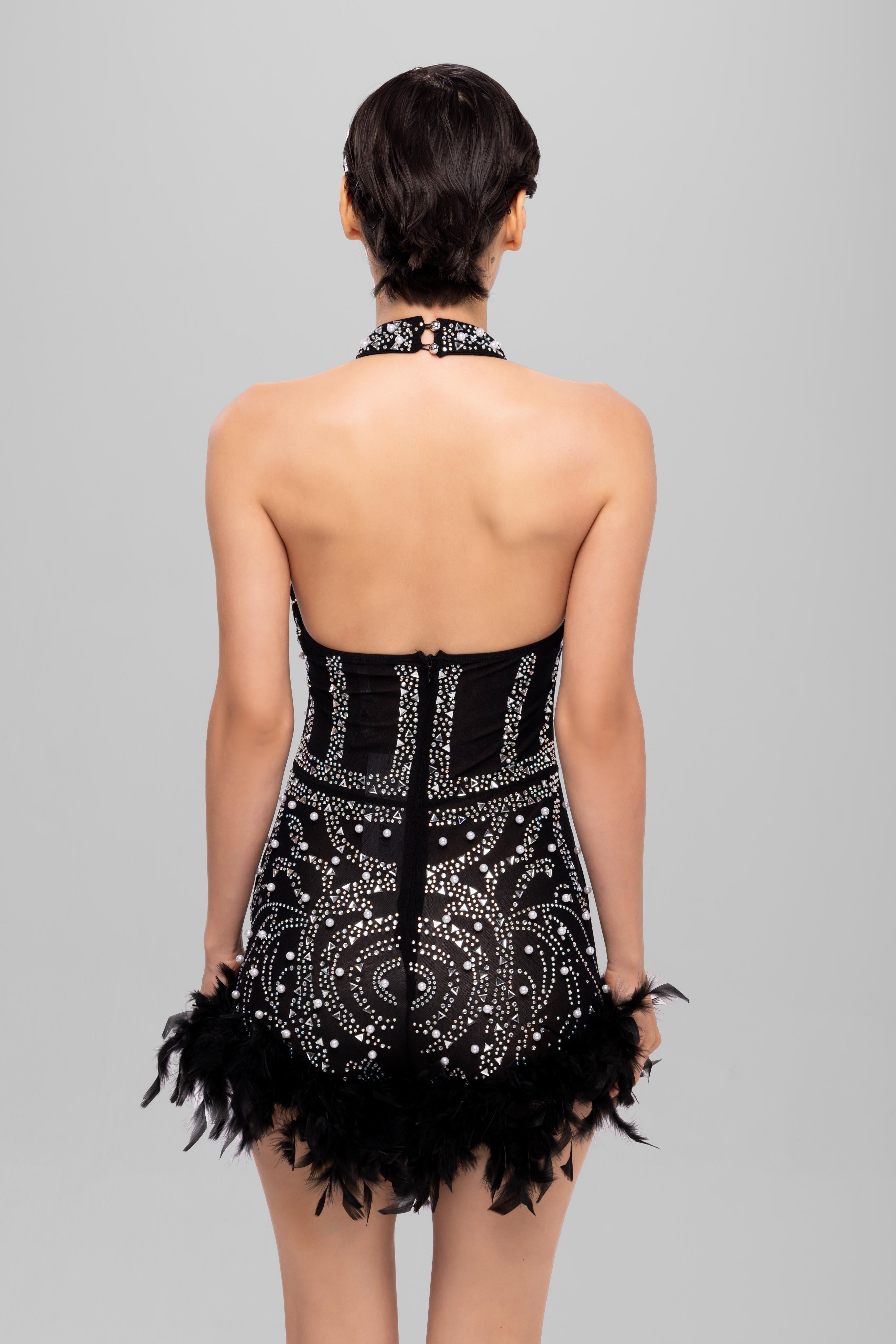 Embellished romper with feather Black